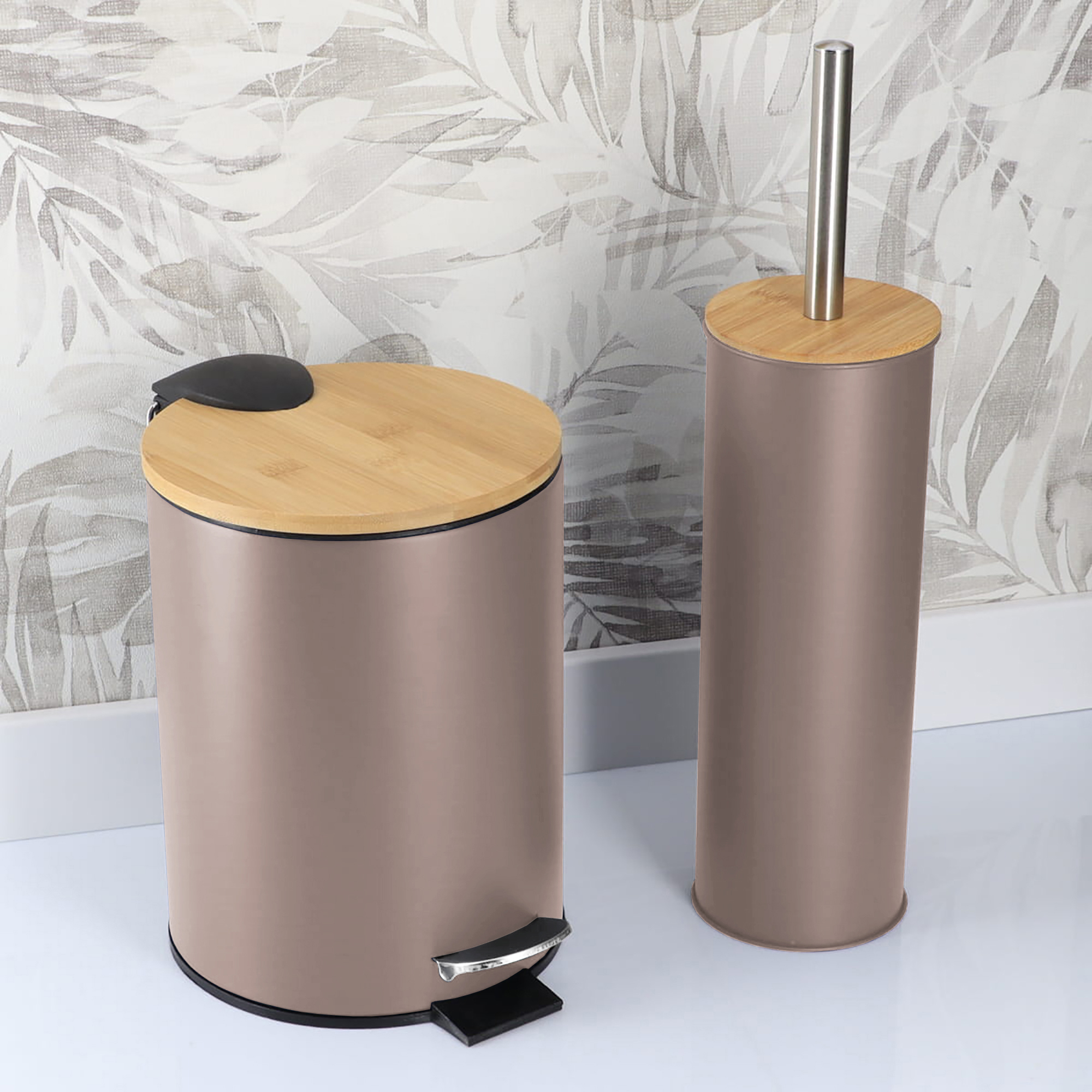 Cappuccino bathroom trash bin and toilet brush holder in a bathroom with patterned wall background