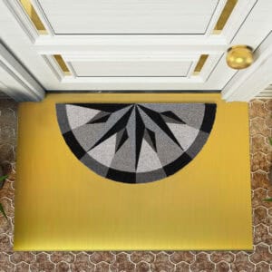 Half-round compass rose coir doormat displayed at front door with golden threshold mat for entryway style