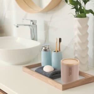 Cotton box on vanity with matching items