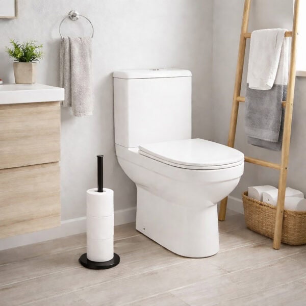 Freestanding toilet paper holder with brushed stainless steel rod and base, holding stacked white rolls2:59 PMMinimalist black metal toilet paper holder with round base, holding stacked white rolls vertically