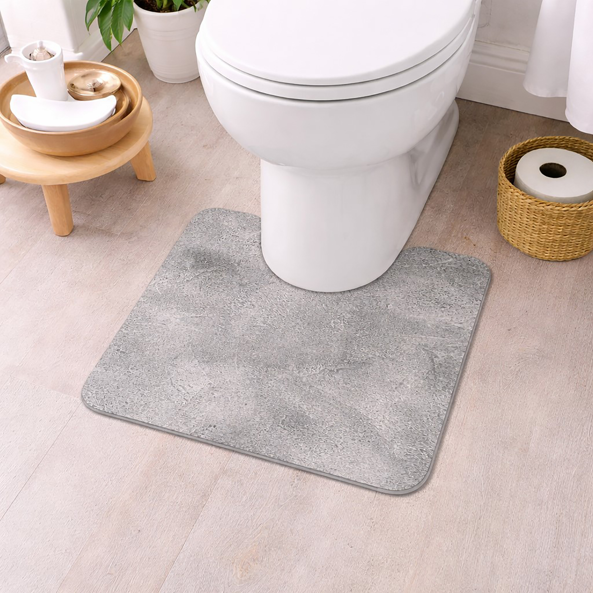 Gray contour bath mat with concrete texture finish