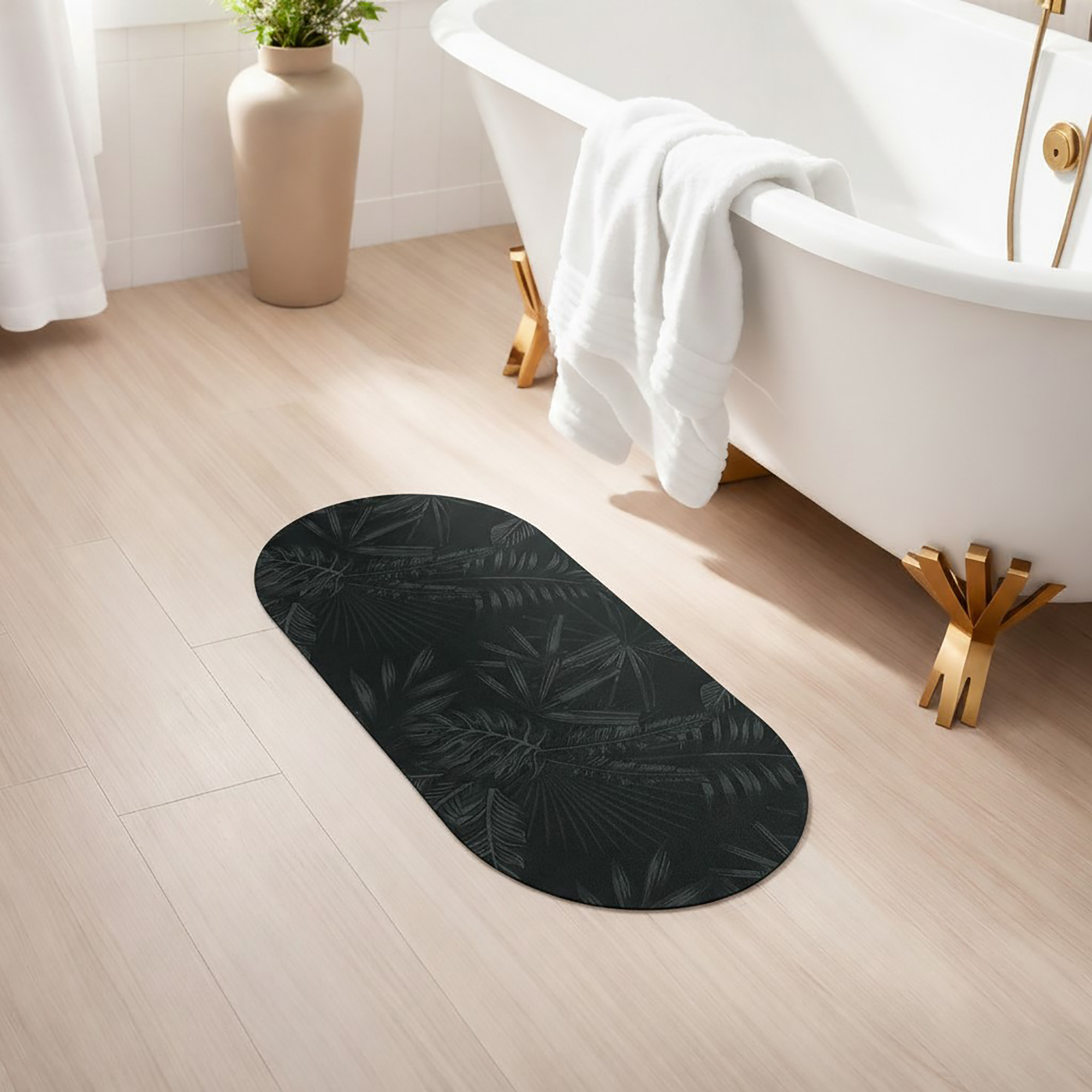 Dark green oval runner mat placed beside bathtub in a modern bathroom, showcasing dramatic tropical ambiance