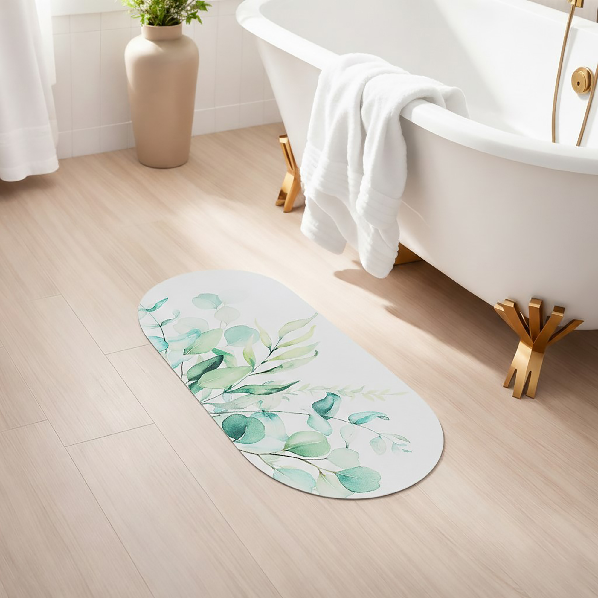 Eucalyptus Mist oval mat beside tub in a sunlit bathroom, adding a clean and airy botanical accent