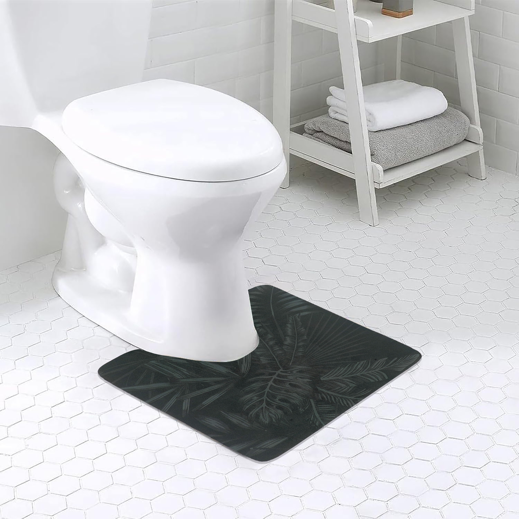 Tropical Night contour mat styled under toilet, adding bold green accents to a white-tile bathroom