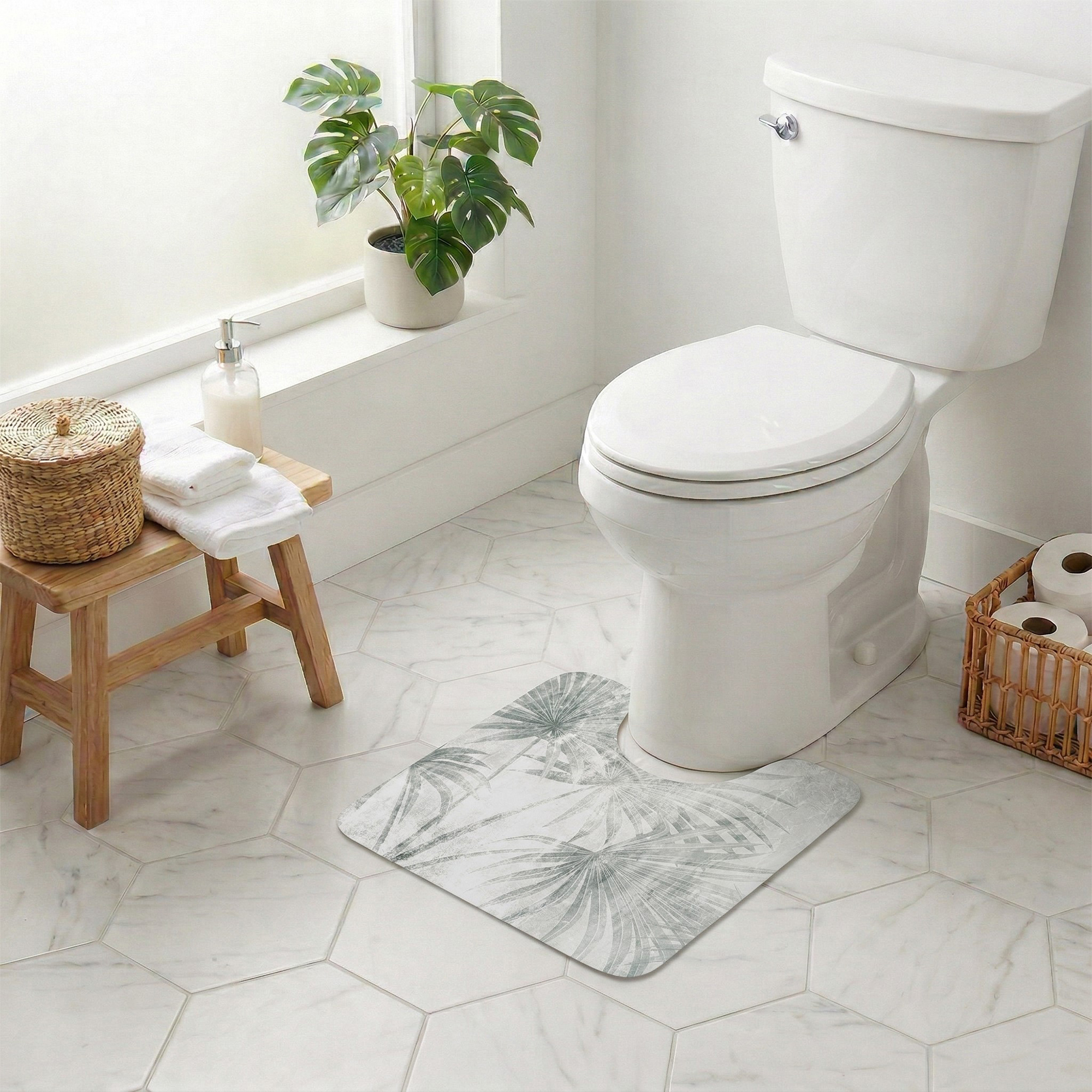 Palm Breeze contour mat styled around toilet in bright bathroom with plant and wicker accents
