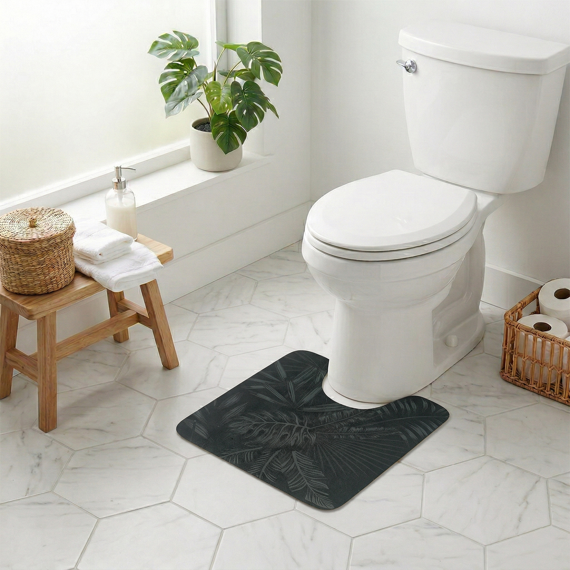 Tropical Night contour mat styled around toilet in bright bathroom with monstera plant and wicker accents