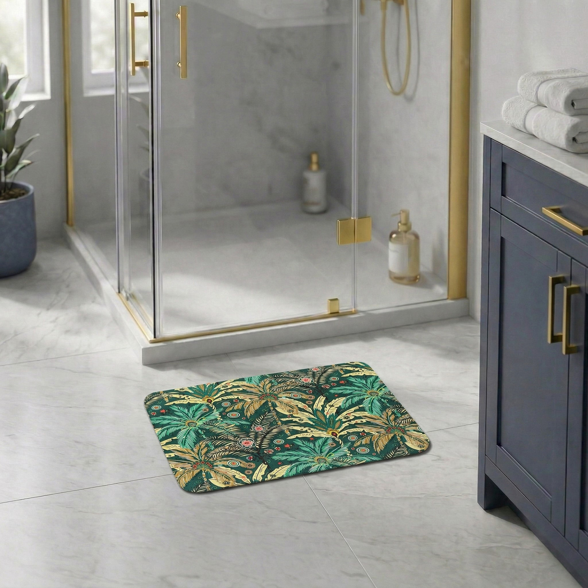 Jungle Bloom bath mat in modern bathroom with glass shower and navy vanity