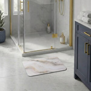 Marble Vein bath mat in modern bathroom with glass shower and navy vanity