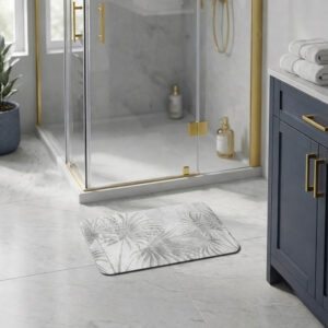 Palm Breeze bath mat in modern bathroom with glass shower and navy vanity