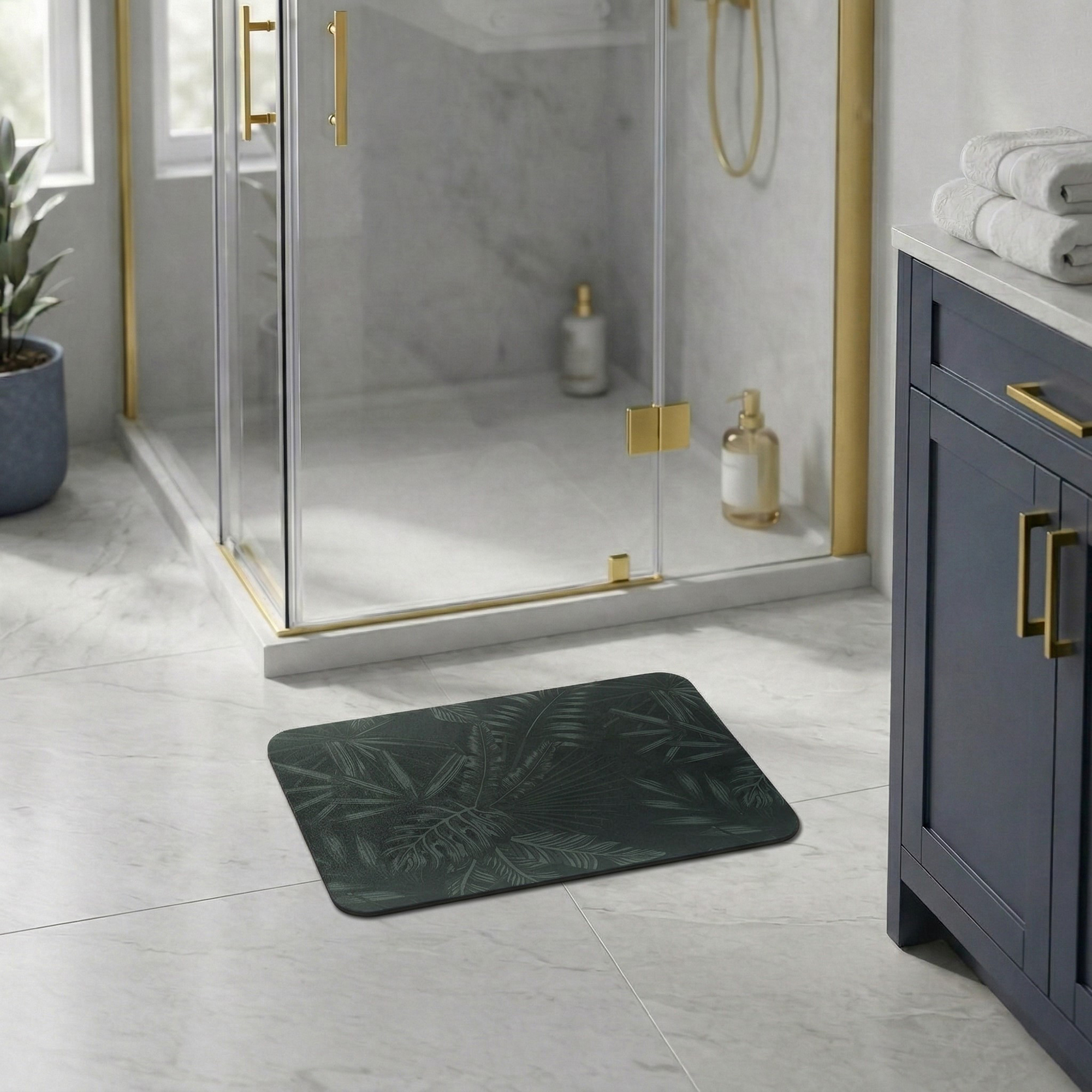 Tropical Night bath mat in modern bathroom with glass shower and navy vanity