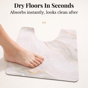 Foot stepping on Marble Vein contour mat showing "Dry Floors In Seconds, Absorbs instantly, looks clean after"
