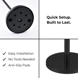 Underside of weighted toilet paper holder base with anti-slip pads and no-tool assembly