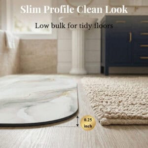 Side profile of Marble Vein bath mat runner showing 0.25 inch slim thickness next to woven rug