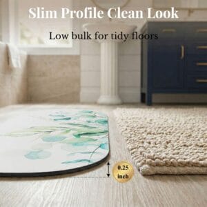 Side profile of Eucalyptus Mist bath mat runner showing 0.25 inch slim thickness next to woven rug