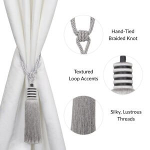 Close-up of silver mist curtain tieback featuring braided loop, ribbed detailing, and lustrous flowing threads