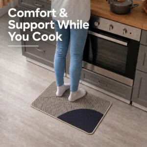 Person standing comfortably on a beige kitchen mat while cooking at the counter, cushioned support that eases pressure during long tasks.