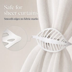 Polished silver leaf curtain tieback with smooth edges shown safe for sheer curtains