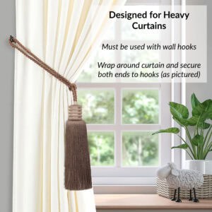 Mocha brown tieback wrapped around heavy curtain and hooked at both ends for secure decorative hold