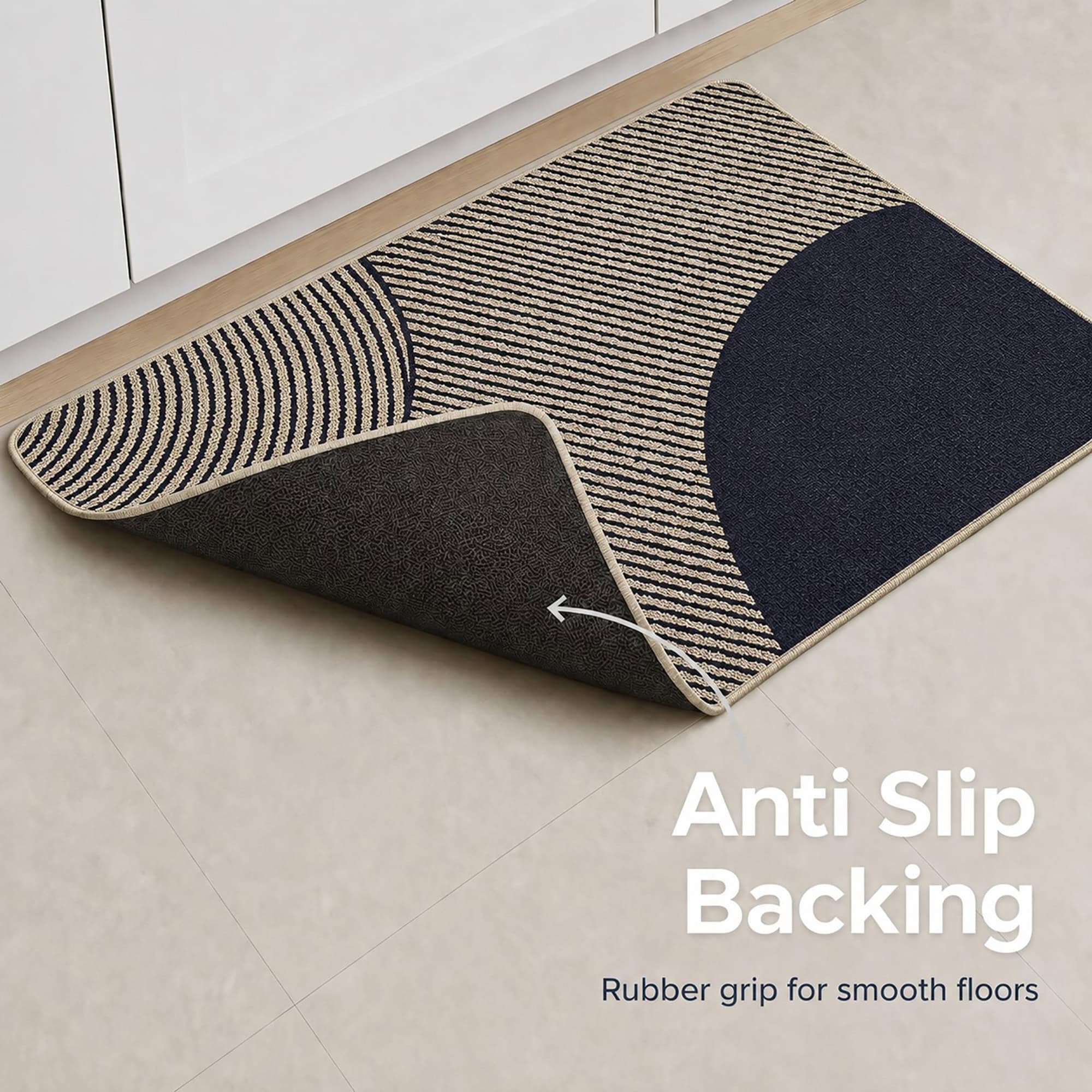 Underside of beige kitchen mat showing textured rubber anti-slip backing that grips smooth floors and keeps both set pieces firmly in place.