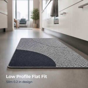 Gray kitchen mat lying flat against the floor with a slim low-profile design that sits seamlessly without bulky height or tripping edges.