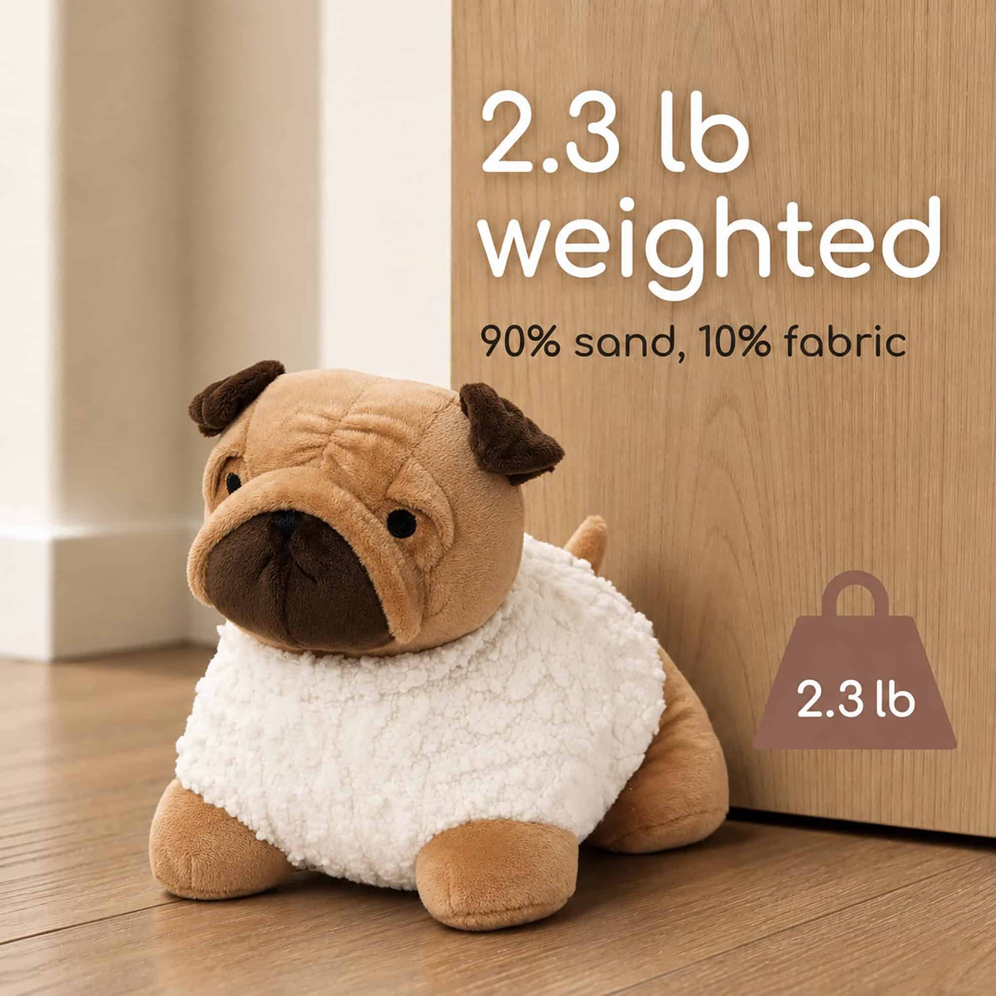Tan pug door stopper propping open a wood door on hardwood floor, with a weight icon. On-image text: "2.3 lb weighted," "90% sand, 10% fabric," "2.3 lb."