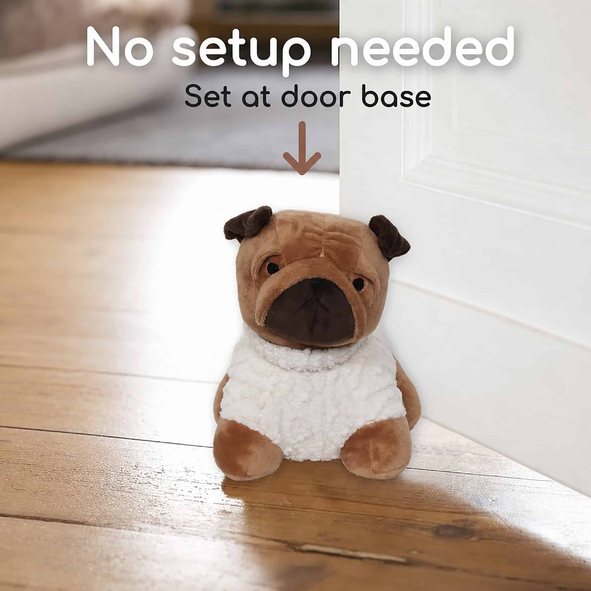 Tan pug door stopper set at the base of a white door on hardwood floor, with an arrow. On-image text: "No setup needed," "Set at door base."