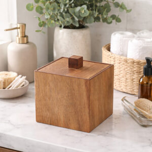 Square acacia wood storage box with lid and cube knob on marble countertop with bathroom accessories