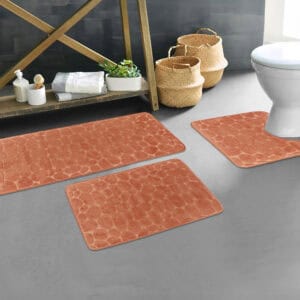 Copper pebble bathroom mat set styled in modern bathroom décor