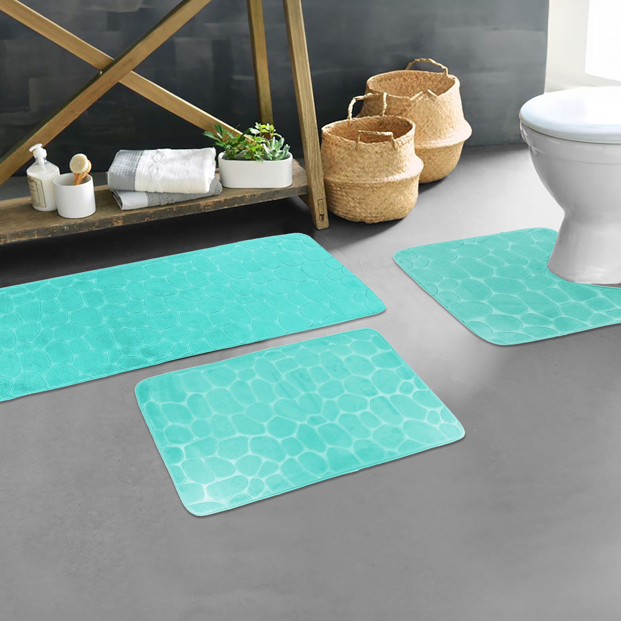 Aqua blue pebble bathroom mat set styled in modern bathroom décor