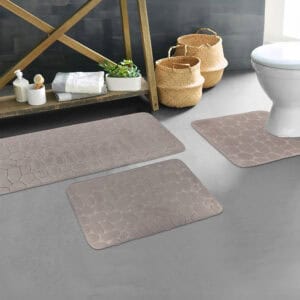 Taupe pebble bathroom mat set styled in modern bathroom décor