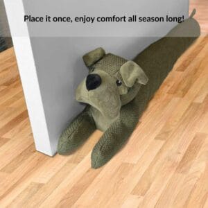 Close-up of dog draft stopper placed at the corner of a door on a wooden floor