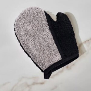 Close-up of dual-textured mitt showing black and gray textured surfaces