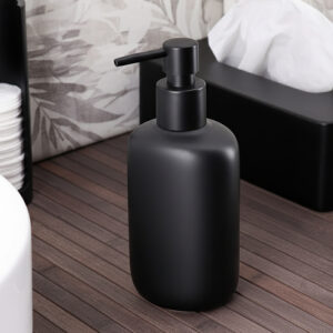 Black soap dispenser on bathroom counter