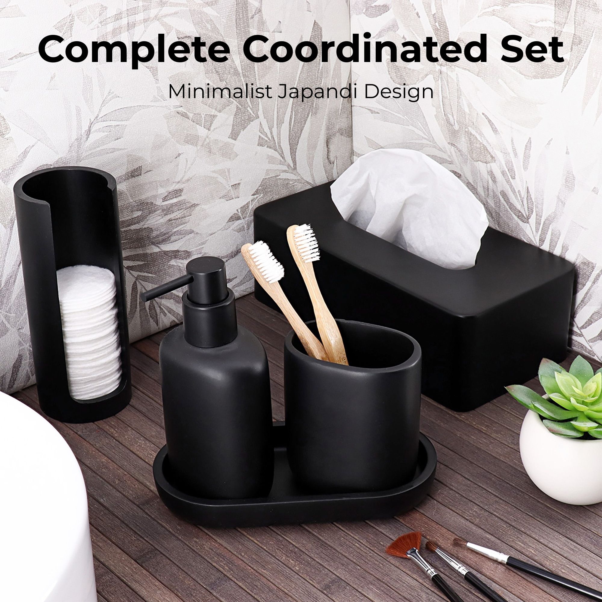 Black coordinated bathroom accessory set with oval tray