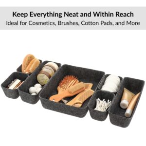 Gray felt drawer organizers holding brushes cosmetics and accessories