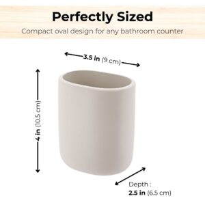 Beige oval bathroom tumbler with size dimensions