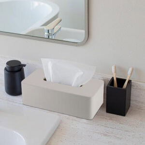 Beige tissue box holder styled on bathroom countertop