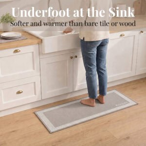 3- Person standing barefoot on taupe kitchen runner at the sink, softer underfoot than tile or wood
