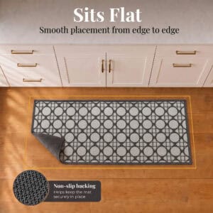 4- Cream and charcoal cane circle kitchen runner lying flat with corner folded to show non slip backing on wood floor