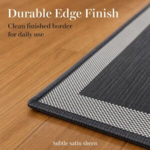 5- Close-up of charcoal and cream kitchen mat clean finished border with a subtle satin sheen on the edge