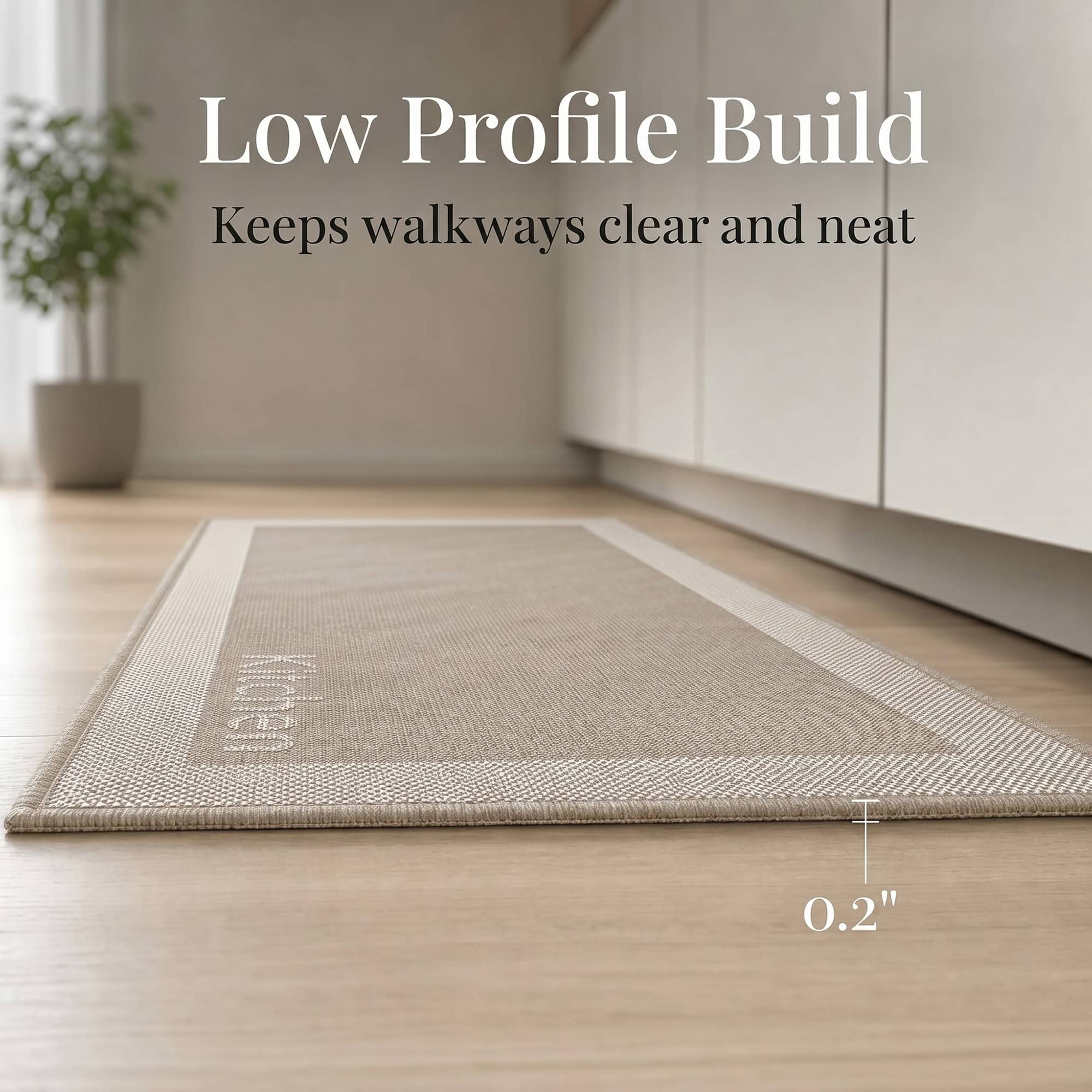 5- Low profile taupe kitchen mat with cream border and woven Kitchen word, 0.2 inch thin, lying flat on wood floor