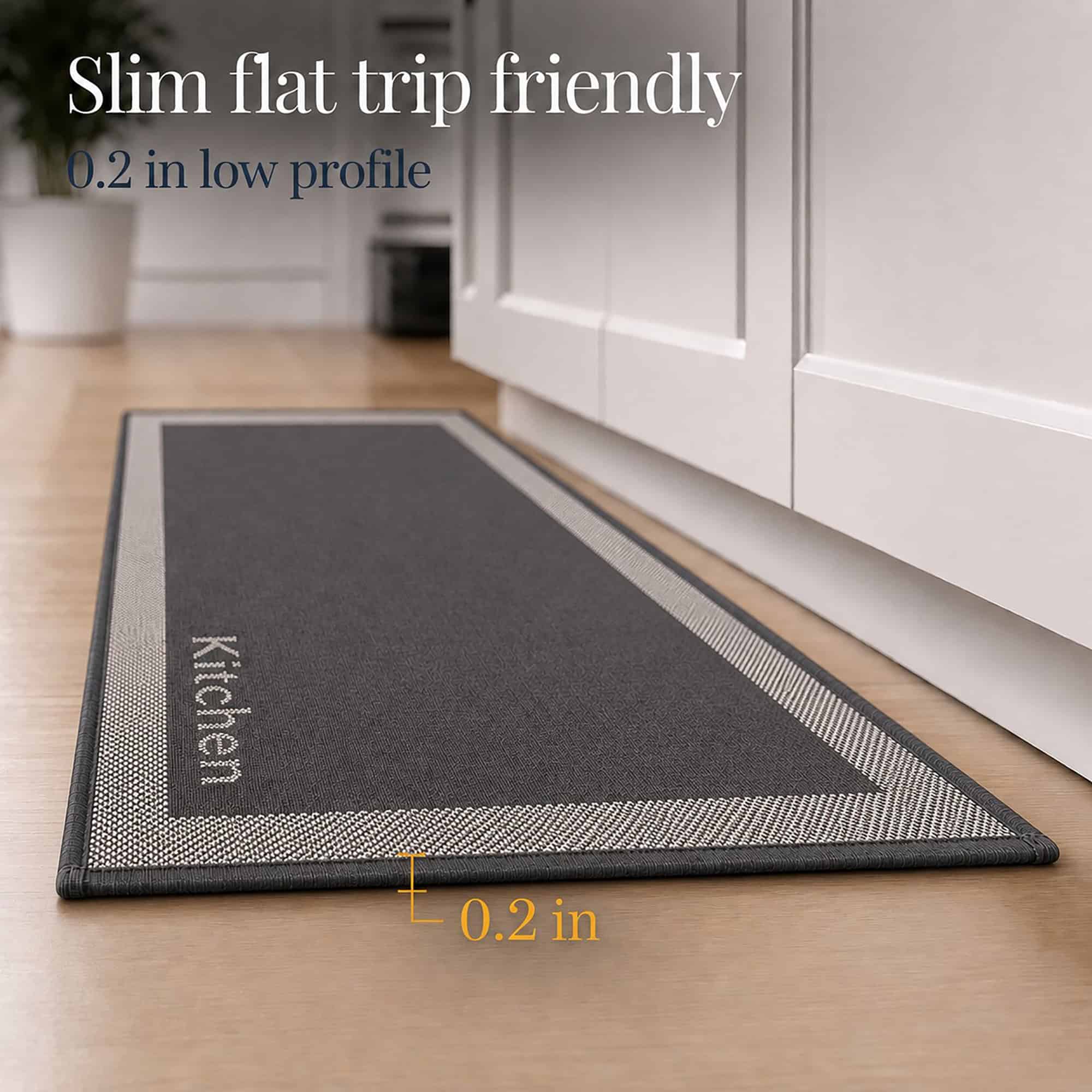 6- Low profile charcoal kitchen runner with cream border and woven Kitchen word, 0.2 inch thin, on wood floor