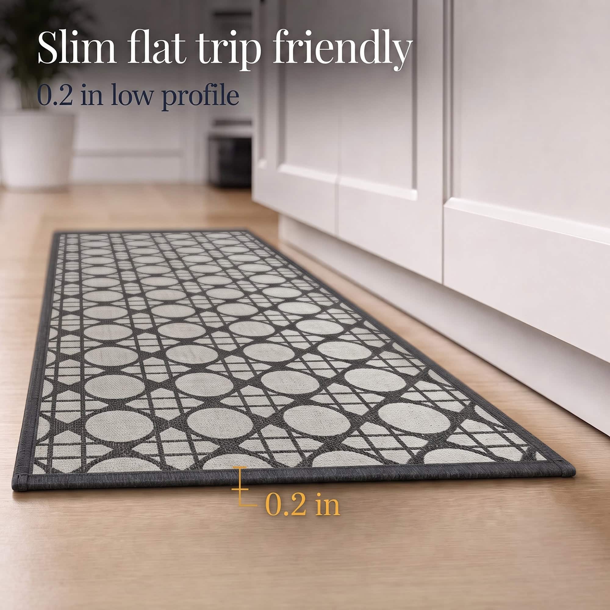 6- Low profile cream and charcoal cane circle kitchen runner, 0.2 inch thin, lying flat on wood floor