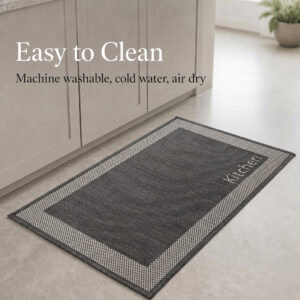 7- Charcoal kitchen mat with cream border and Kitchen word on tile floor, machine washable in cold water and air dry