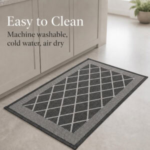 7- Charcoal gray trellis kitchen mat on tile floor, machine washable in cold water and air dry
