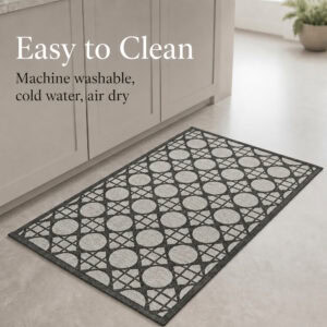 7- Cream and charcoal cane lattice kitchen mat on tile floor, machine washable in cold water and air dry