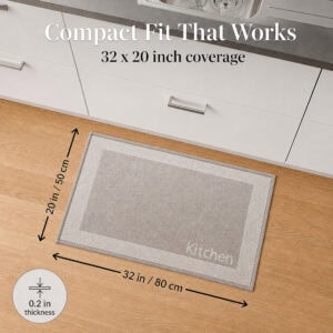 8- Top view of taupe and cream bordered kitchen mat measuring 32 by 20 inches, 0.2 inch thick, at the sink