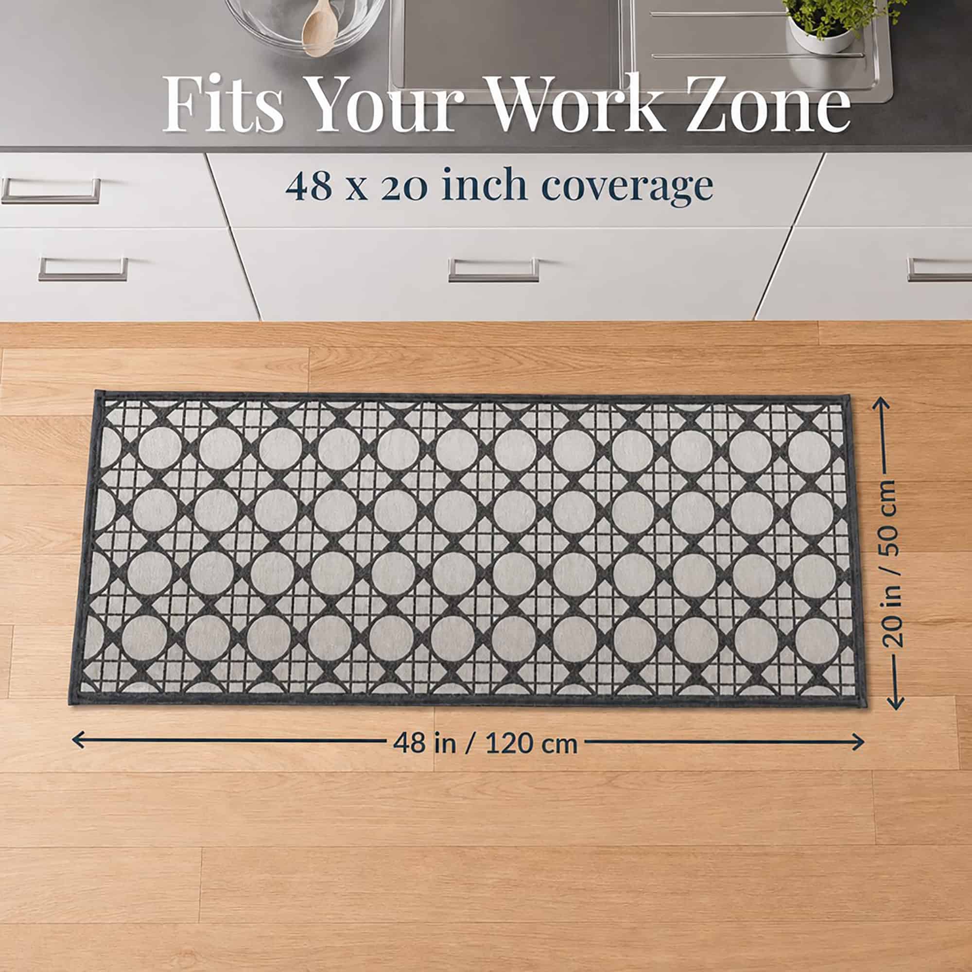 8- Cream and charcoal cane circle kitchen runner at the sink, 48 by 20 inches, sized to fit the work zone