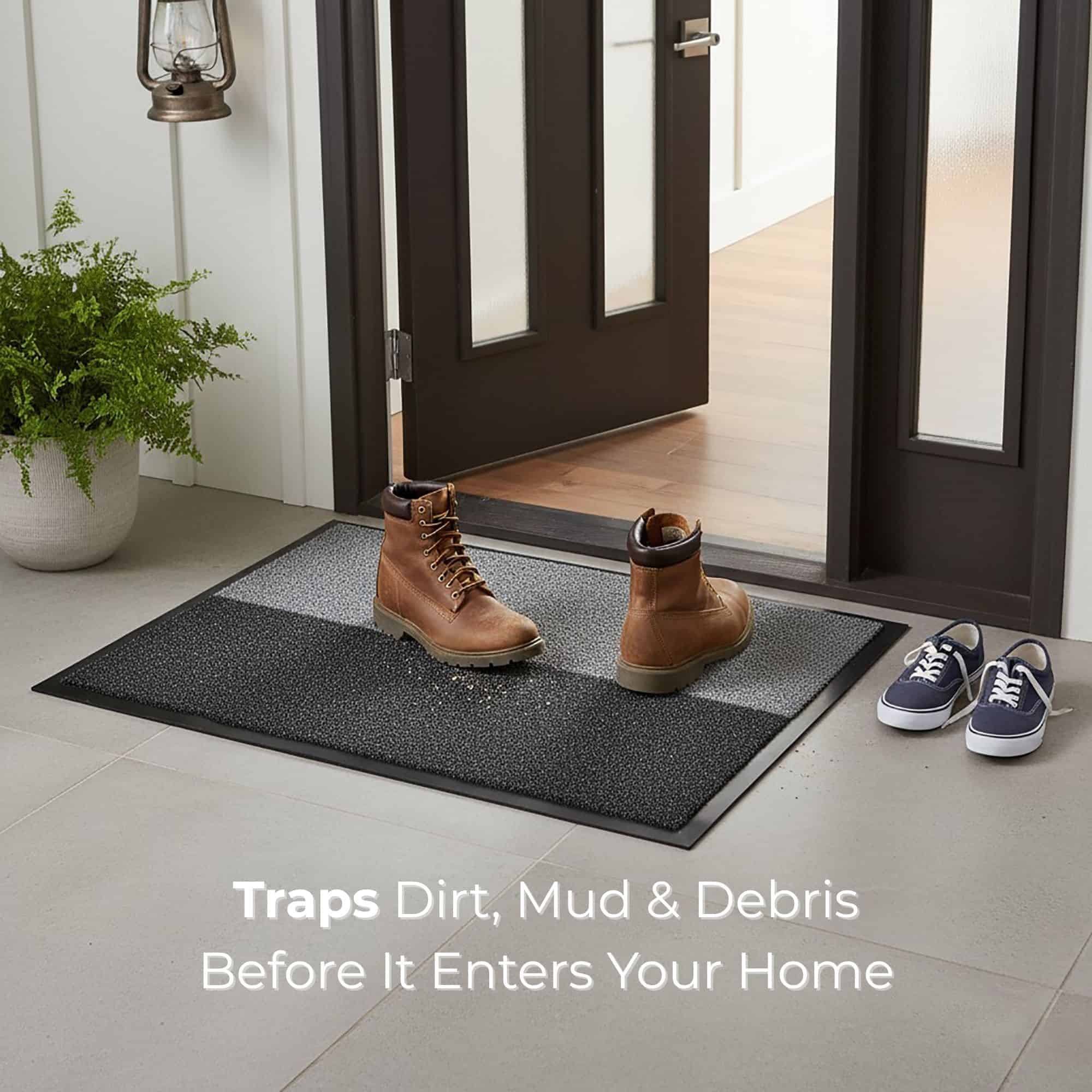Doormat trapping dirt from muddy boots at entrance