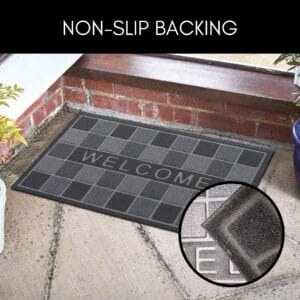 Non-slip rubber backing close-up on gray welcome mat